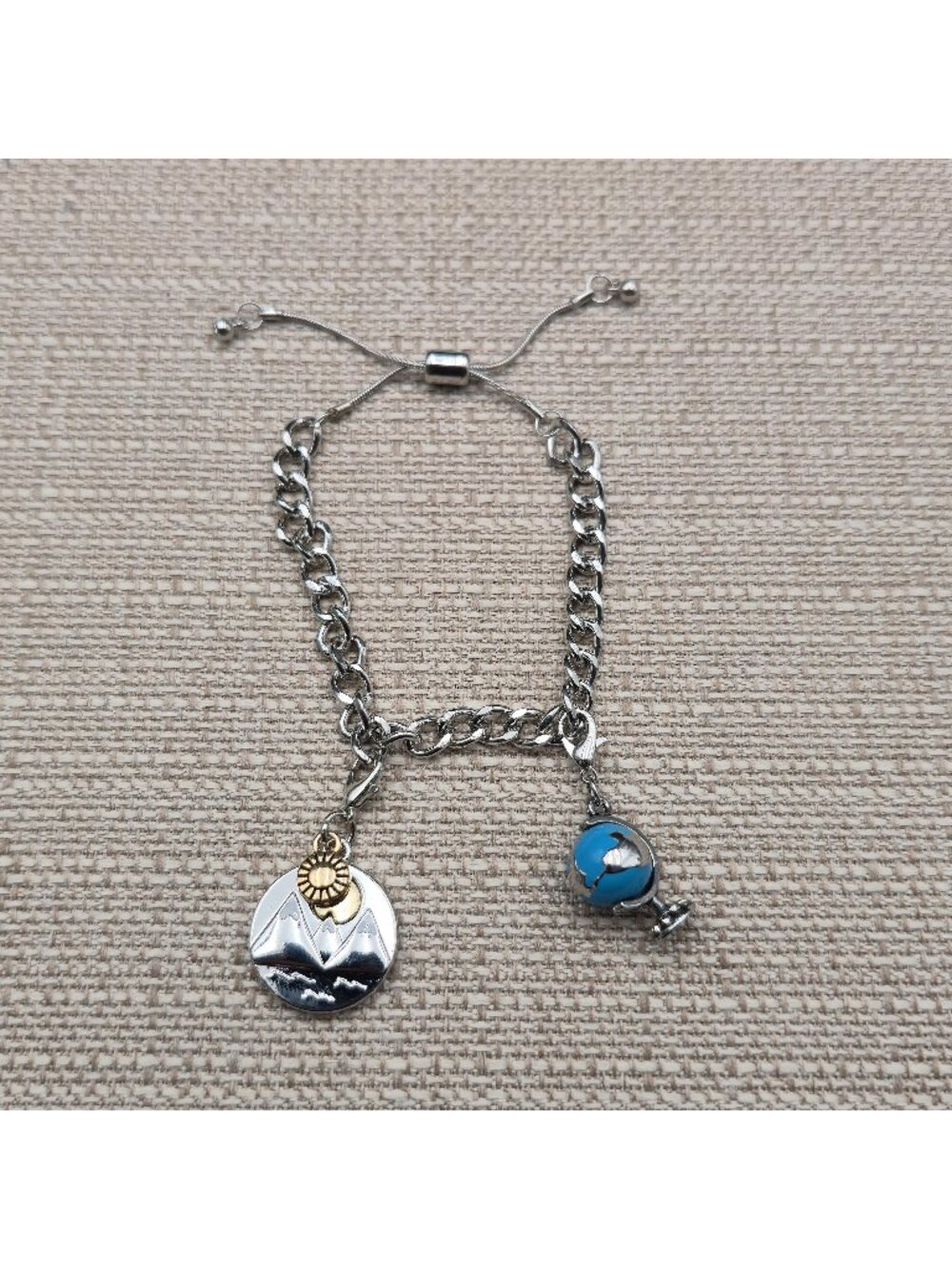 7 Inch Stainless Steel Mountain and Globe Charm Bolo Adjustable Bracelet A8203